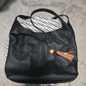 The Sak Huntley Hobo Black Leather Shoulder Bag with Tassel